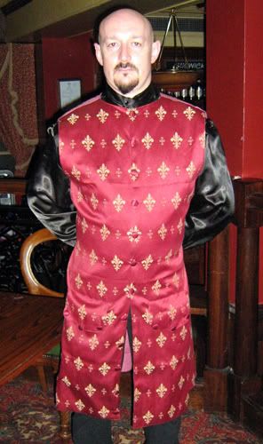 Paul's red and gold waistcoat...
